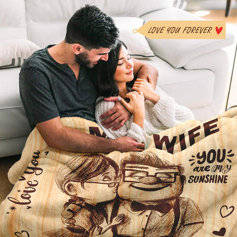 NAIREG blanket neatly folded with ribbon gift-ready, perfect anniversary presentation