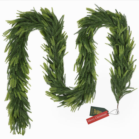 N&T NIETING garland on a porch railing demonstrating weather-resistant outdoor decorating use