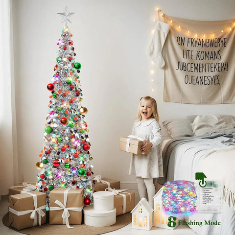 N&T NIETING lit slim tree in room corner creating cheerful ambiance