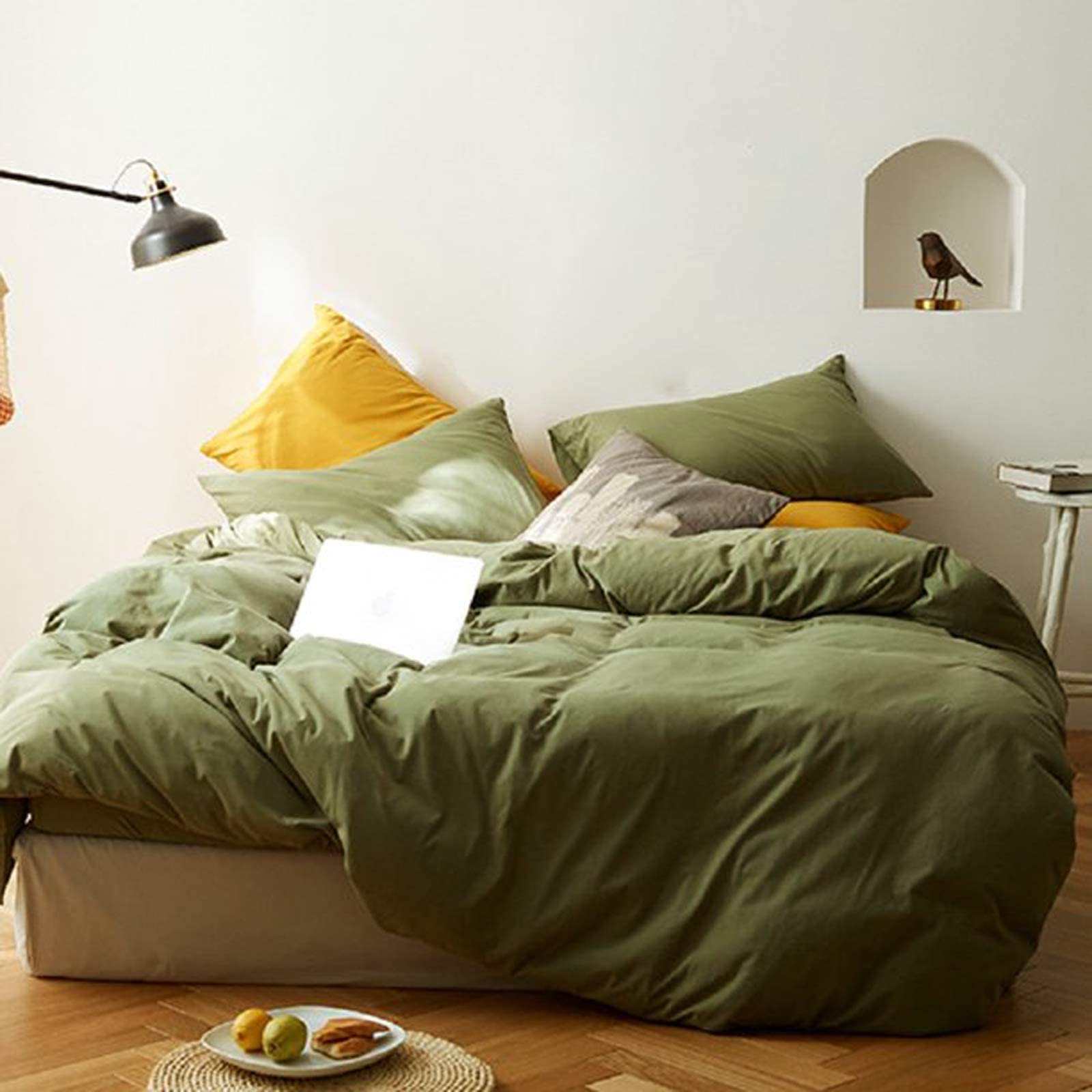 Nanko king comforter on styled bed to show scale and coordinated bedroom effect
