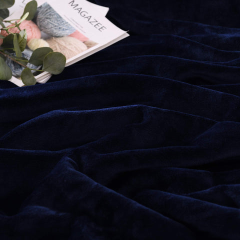 NANPIPER blanket spread on twin bed showing full coverage and cozy look