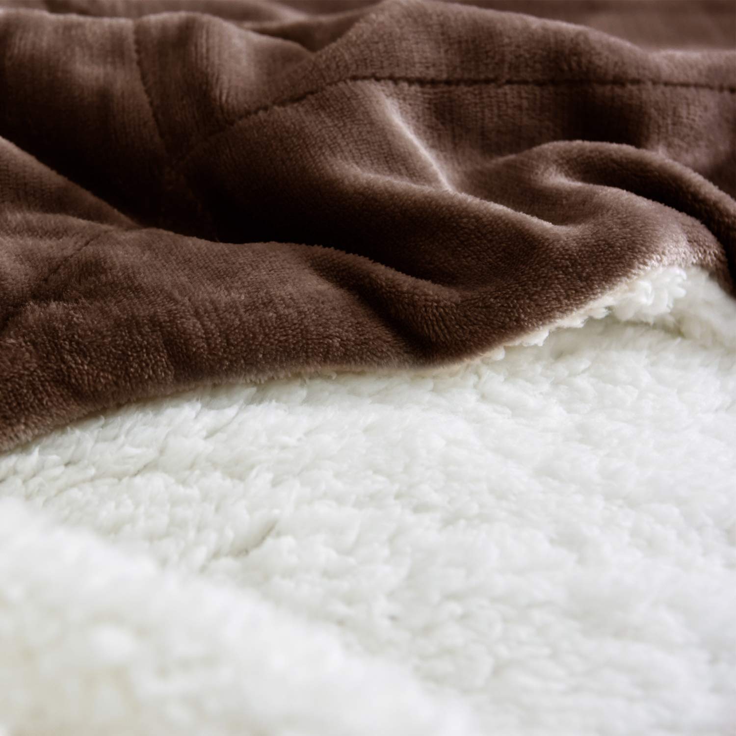 NANPIPER blanket spread on twin bed offering full coverage and style