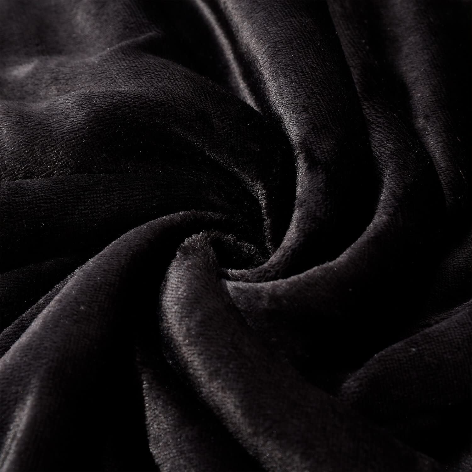 NANPIPER blanket draped on couch in living room illustrating cozy use