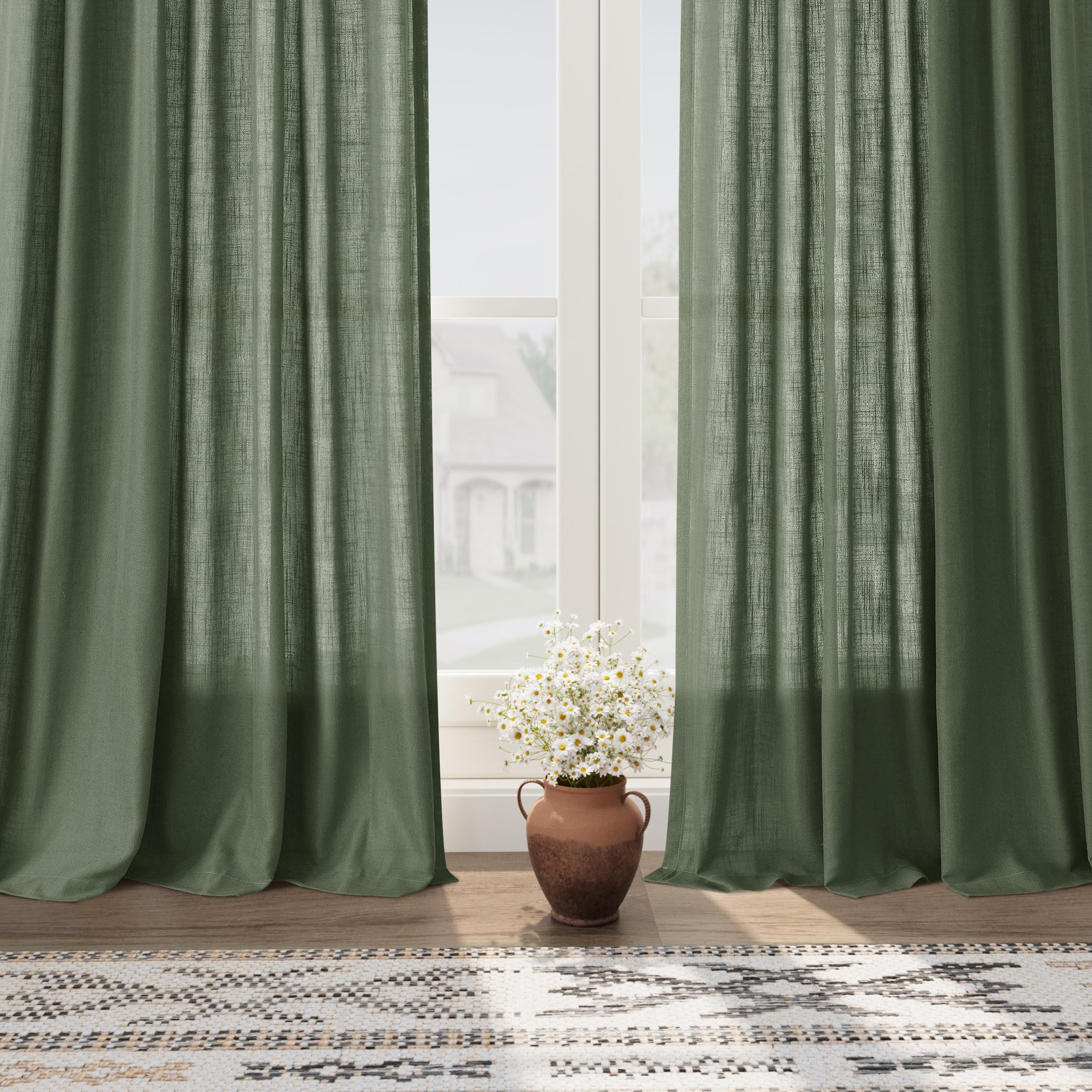 Nanspring curtain beside chair showing scale and full 84 inch length