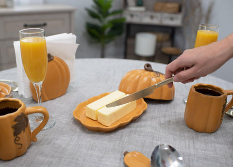 Nat & Jules butter dish beside butter knife for size comparison benefit: easy kitchen fit