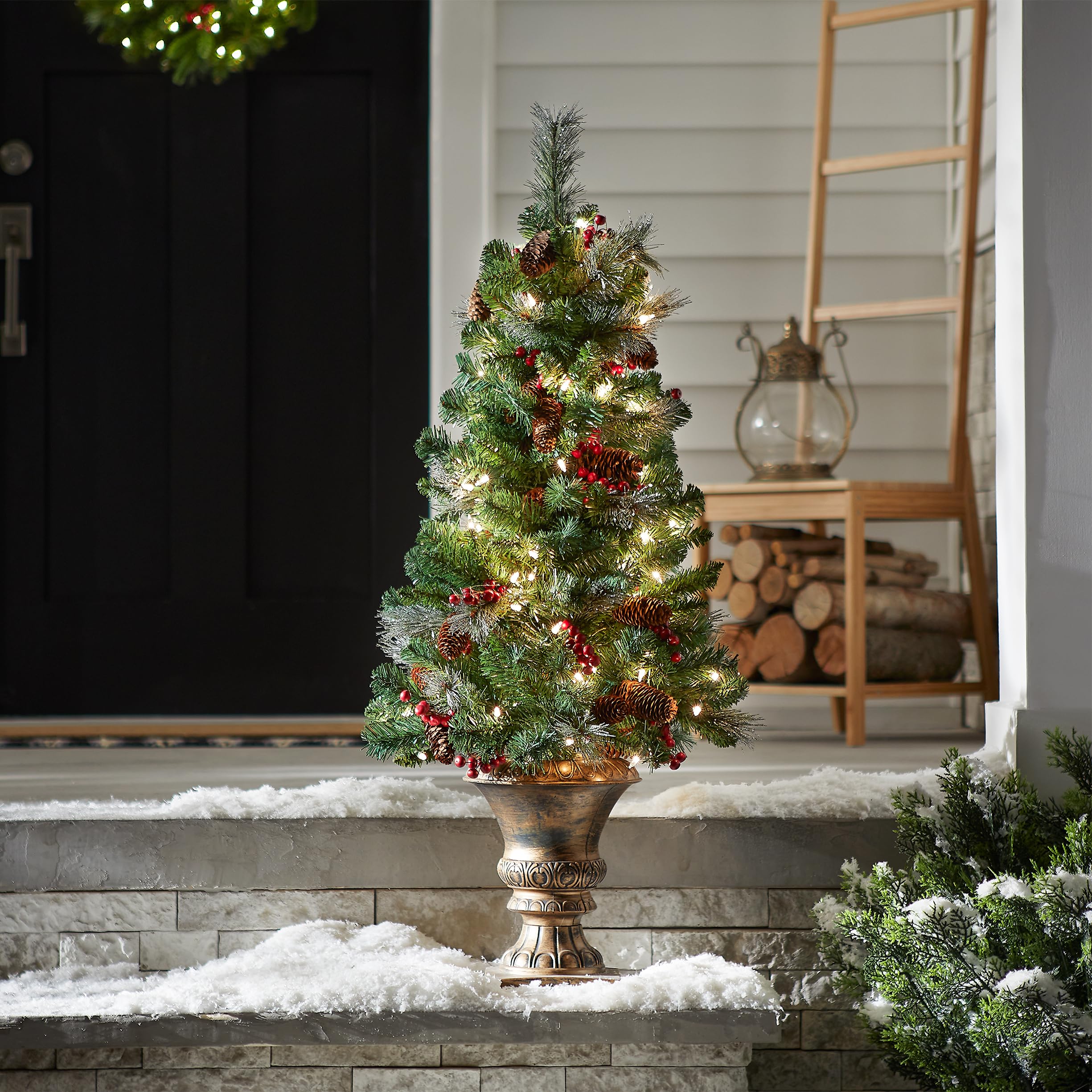 National Tree Company tree in entryway lifestyle scene creating festive atmosphere without blocking the doorway