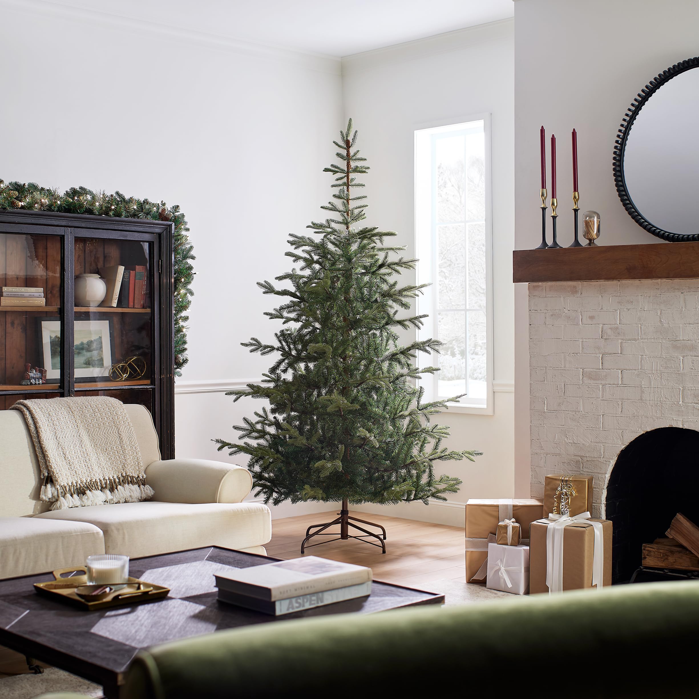 National Tree Company decorated tree in a living room illustrating styling potential and festive ambiance