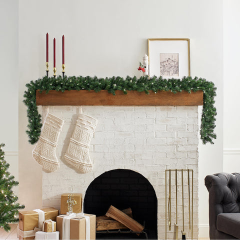 National Tree Company draped over mantel creating festive ambiance and height