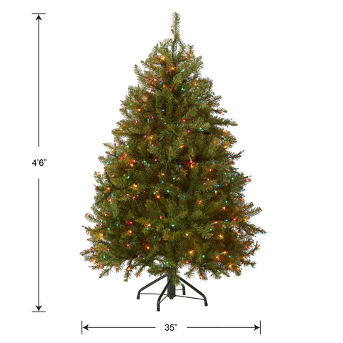 National Tree Company tree in living room setting showing space-saving, decorative benefit