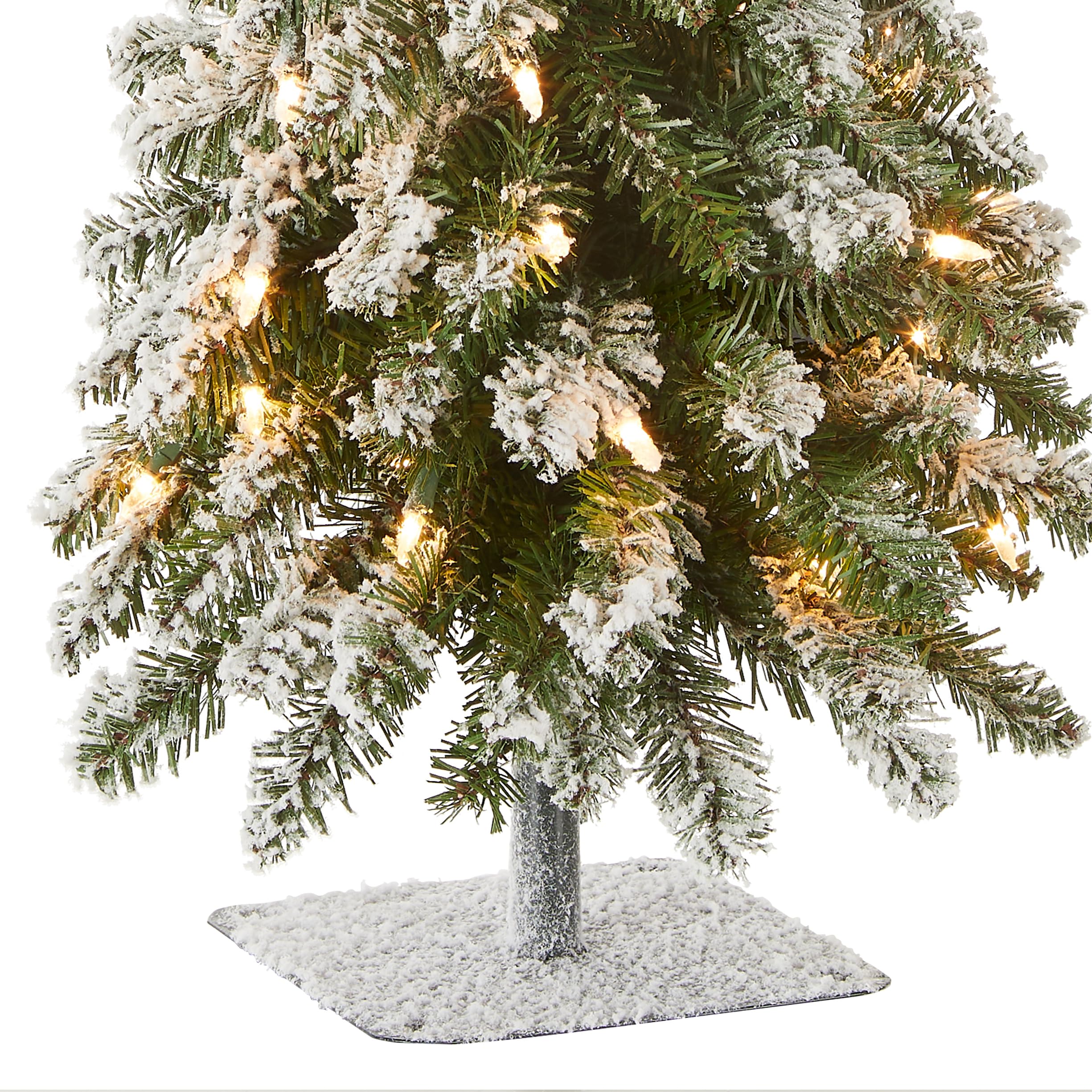 National Tree Company lit Forestree in a living room setting showing festive ambiance and compact convenience