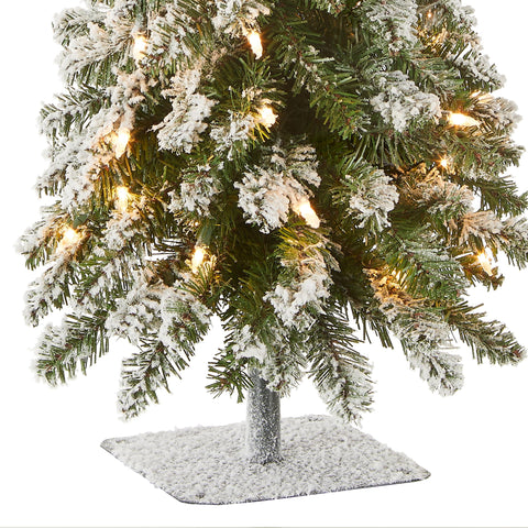 National Tree Company lit Forestree in a living room setting showing festive ambiance and compact convenience