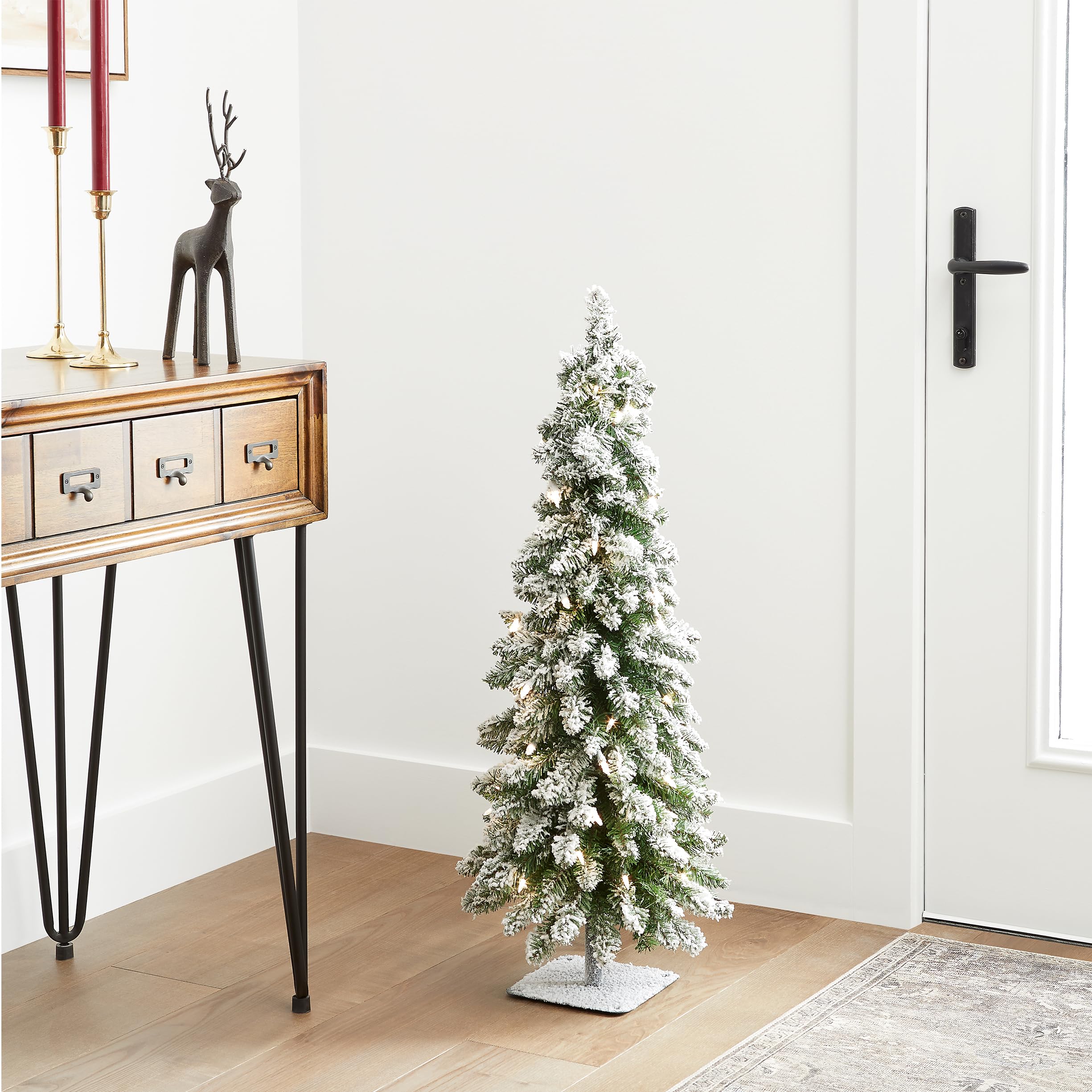 National Tree Company metal plate stand detail showing stable base and durable support benefit