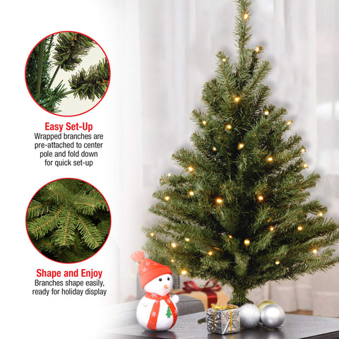 National Tree Company metal base and stand shown stabilizing tree for secure display