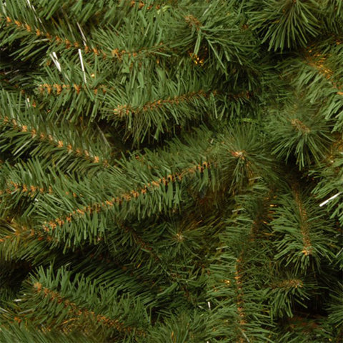 National Tree Company branch holding ornaments to show strong tips and decorating capacity