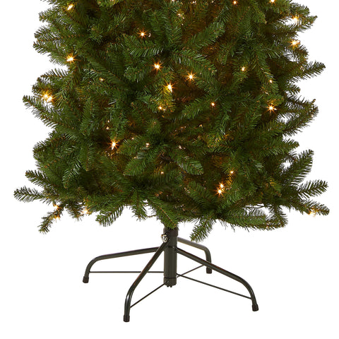 National Tree Company tree lit at night with 350 white lights creating warm holiday atmosphere