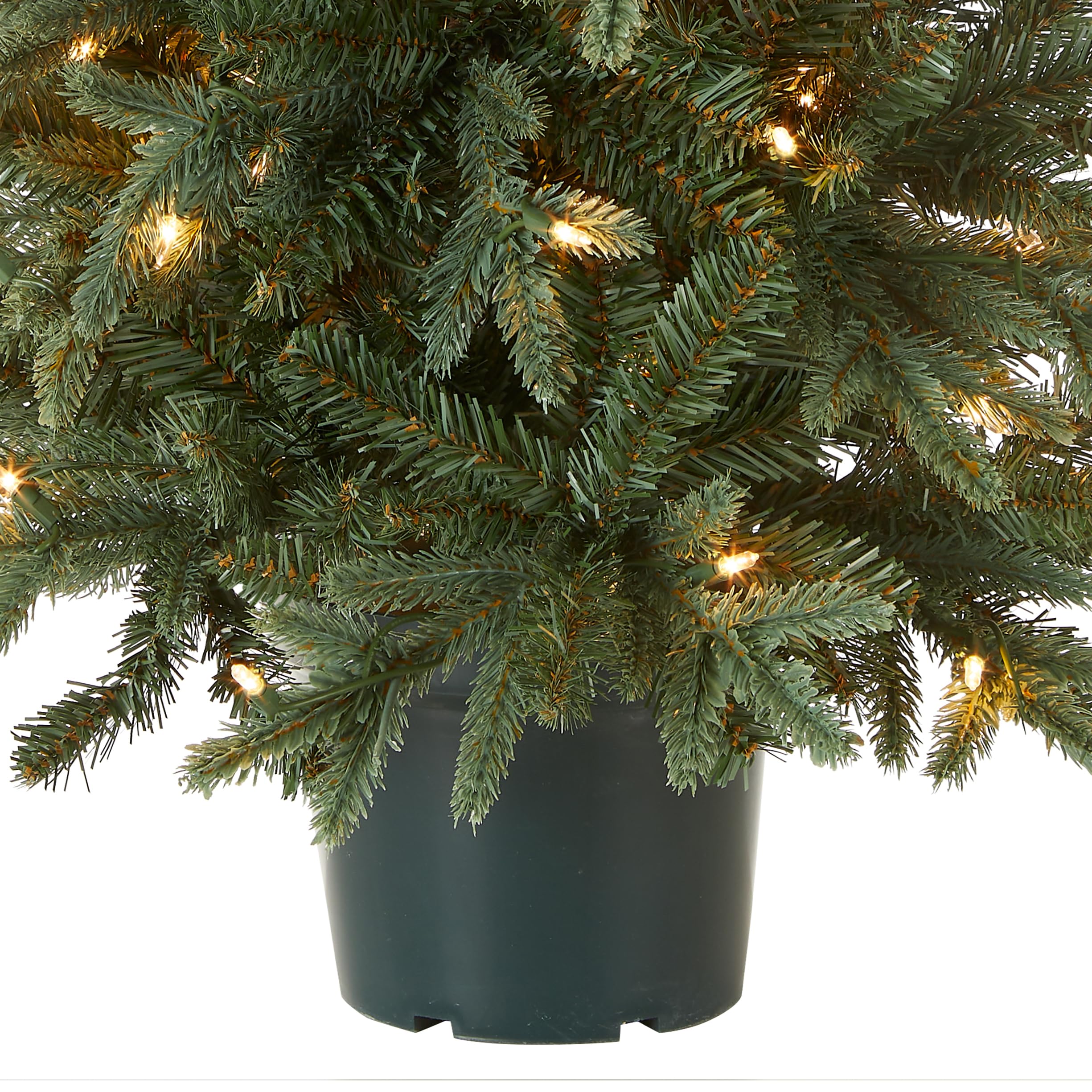 National Tree Company illuminated growers-style pot base emphasizing steady glow and decorative stability