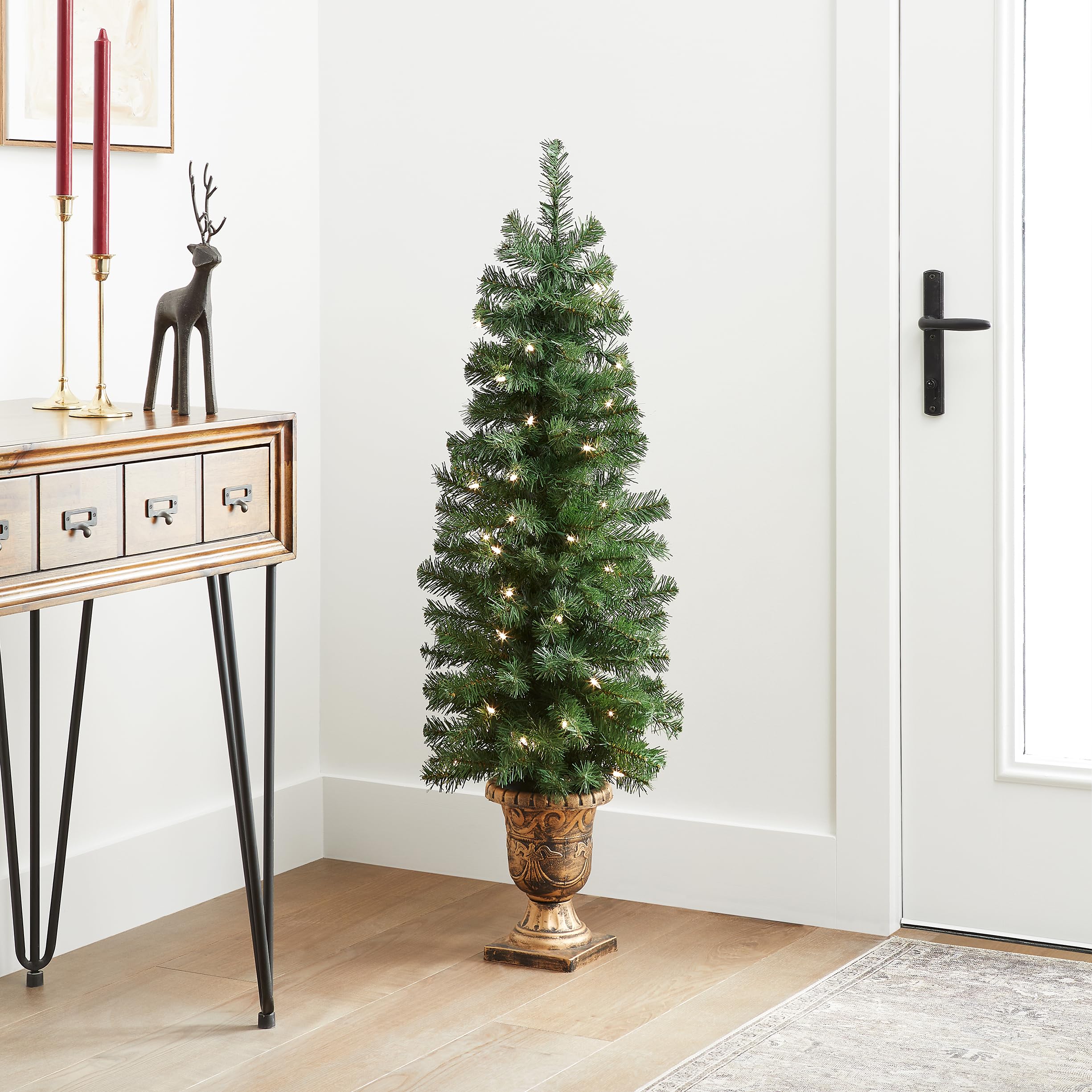 National Tree Company tree placed in a doorway offering welcoming seasonal curb appeal