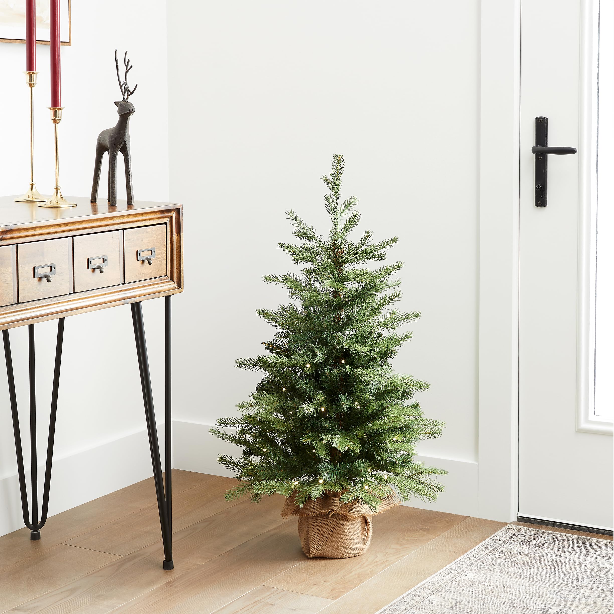 National Tree Company burlap base with height comparison for easy placement