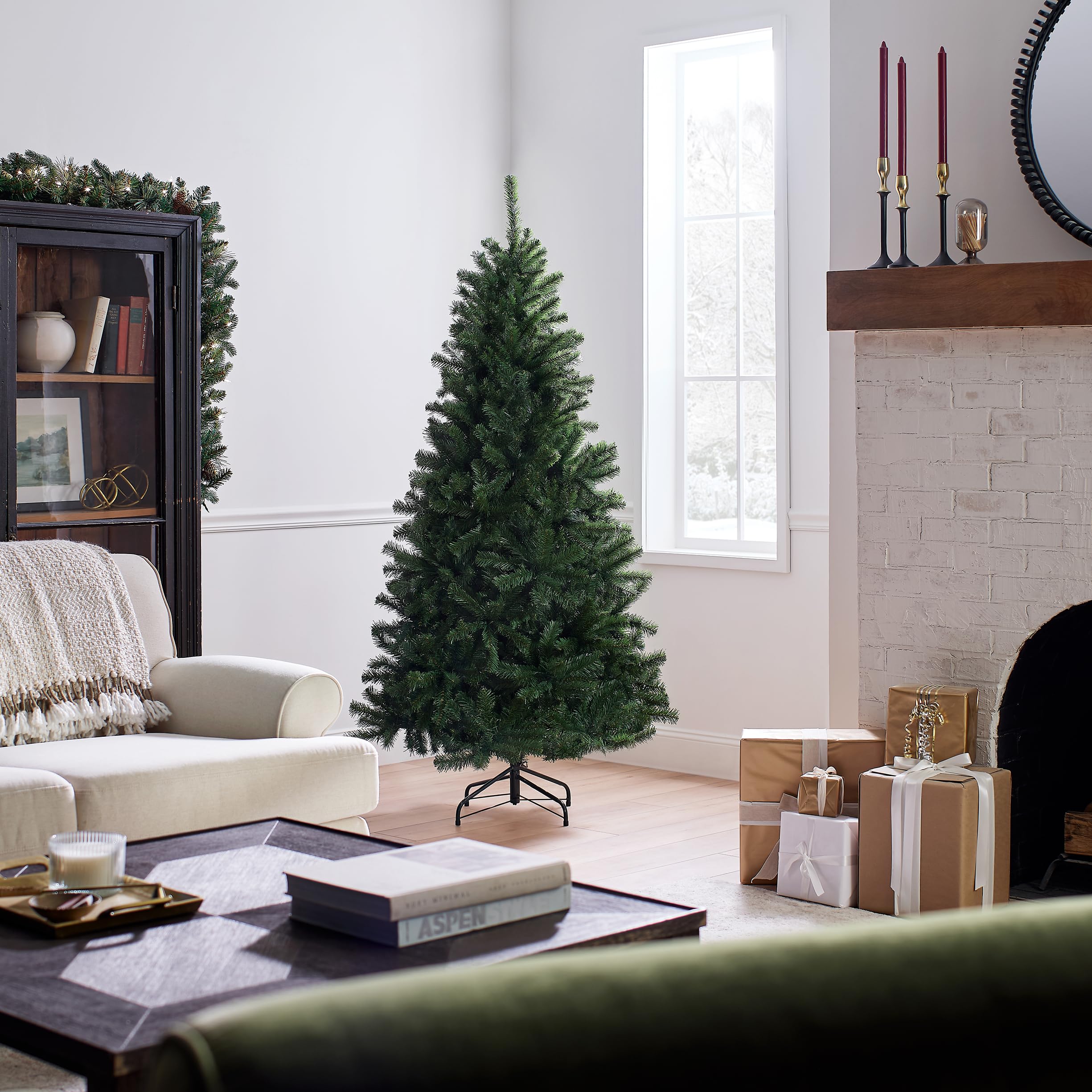 National Tree Company decorated tree in living room showcasing wide profile and festive display