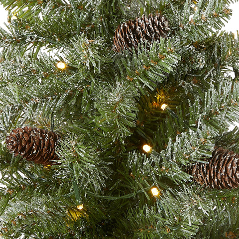 National Tree Company close-up of flocking and pine cone detail, realistic texture benefit