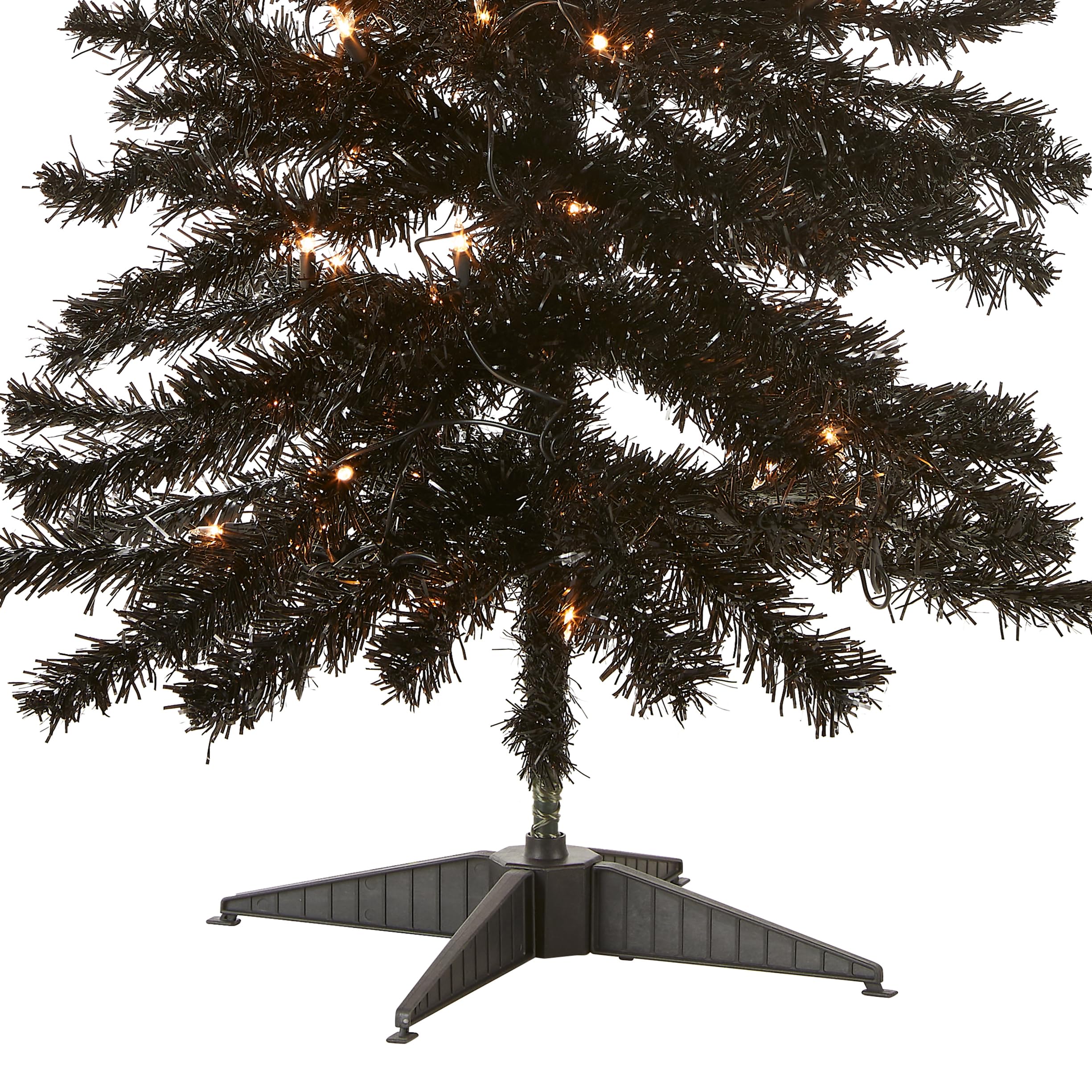 National Tree Company closeup of pre-lit lights shows warm white glow and reliable illumination