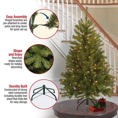 National Tree Company tree in living room staged to show size and festive ambiance