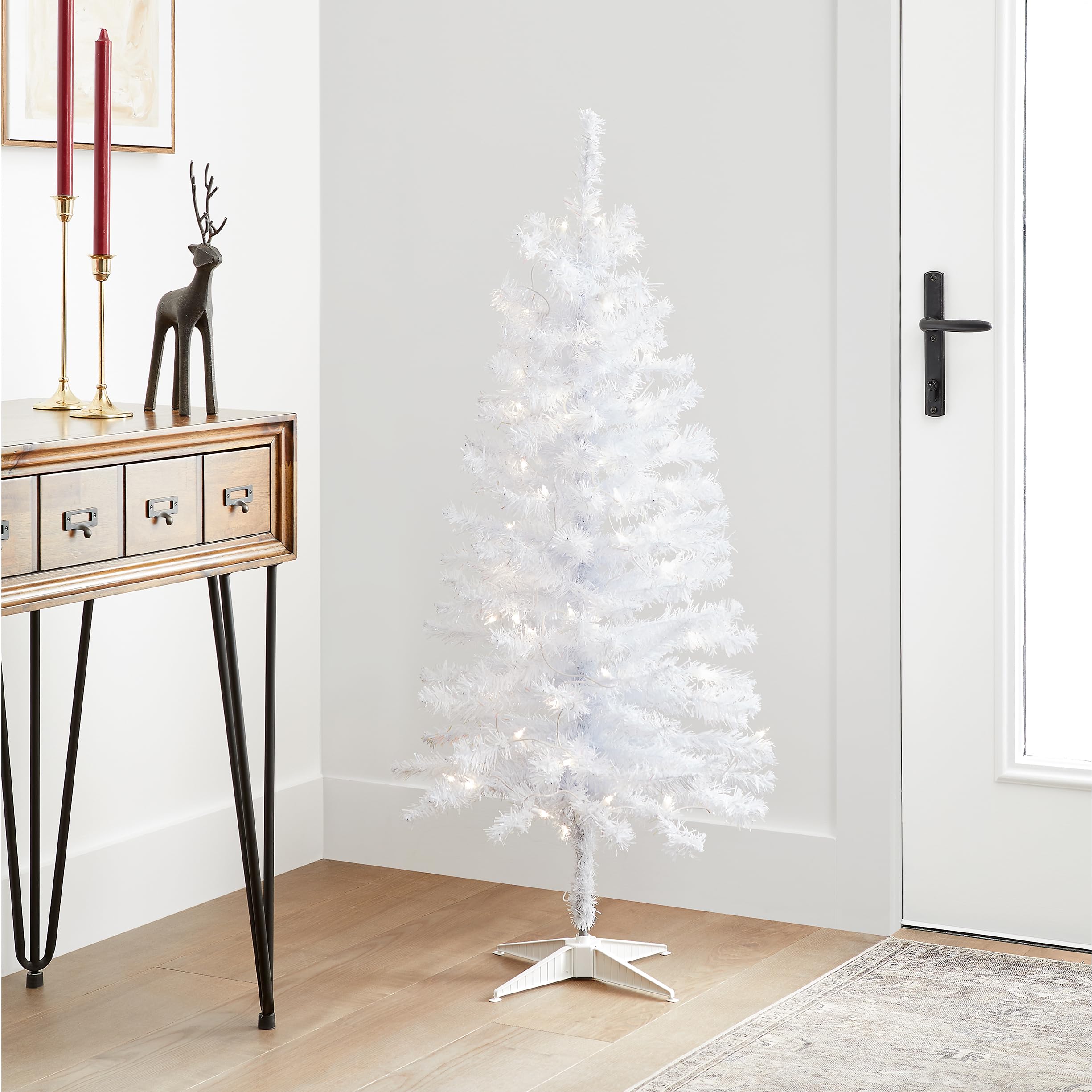National Tree Company styled in small living room showing compact festive decoration benefit