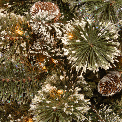 National Tree Company close-up of frosted branch and polyethylene tips, detailed texture adds realistic snowy appeal