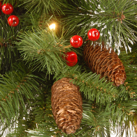 National Tree Company Crestwood Spruce hanging on a door to show 30-inch scale and welcoming ambiance
