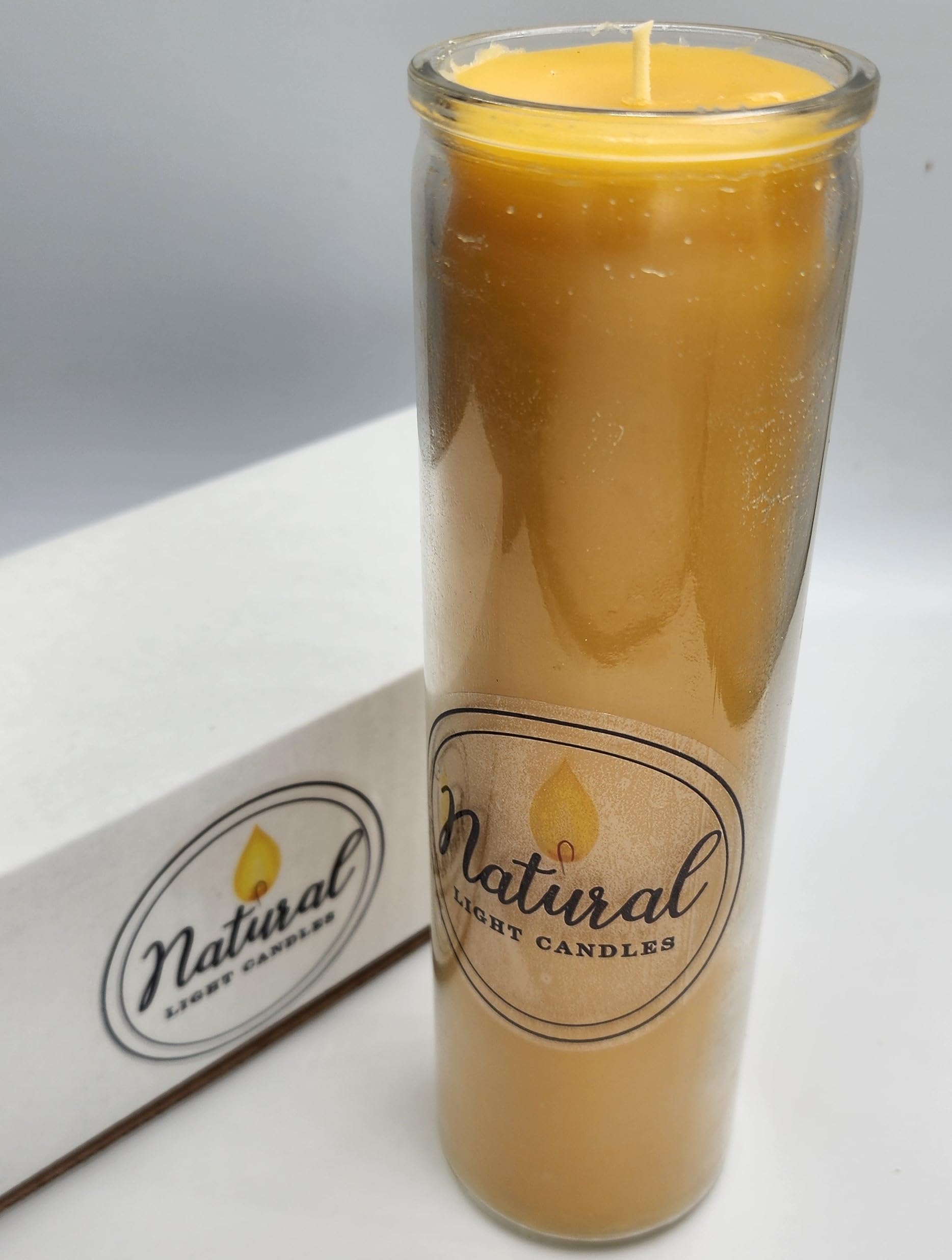 Natural Light candle beside ruler showing 8 inch length and size clarity