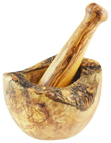 Naturally Med close-up of olive wood grain on pestle highlighting handcrafted durability