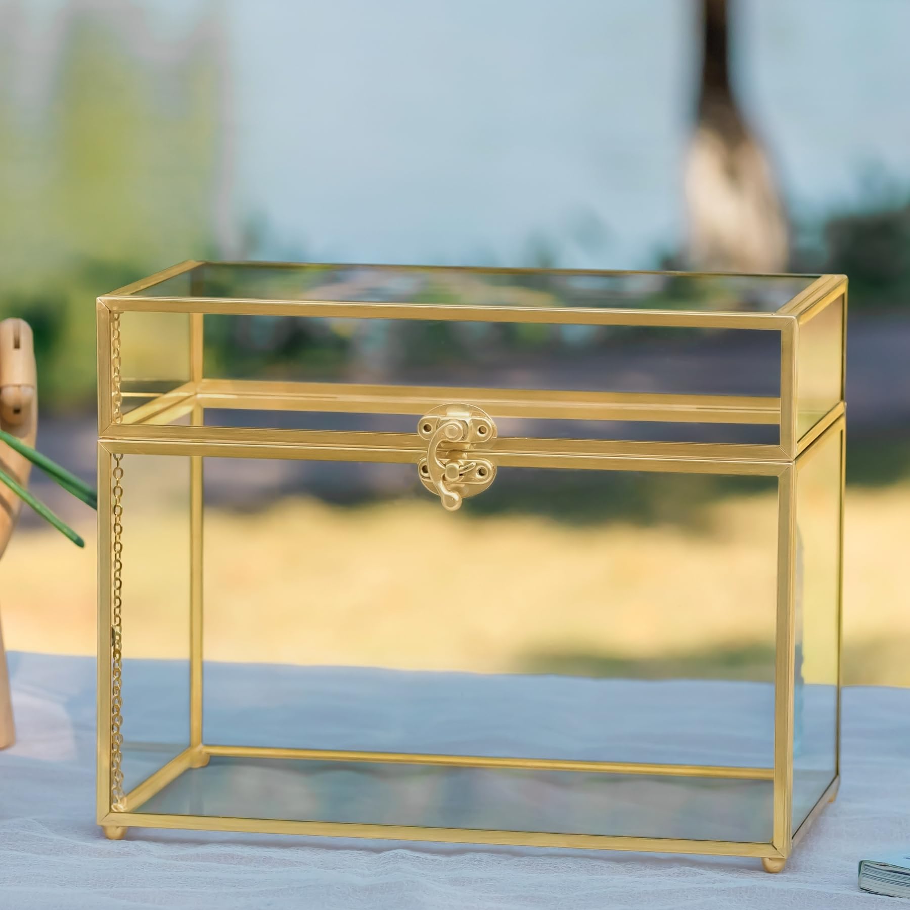 NCYP gold glass box frame closeup showing reinforced edge protection