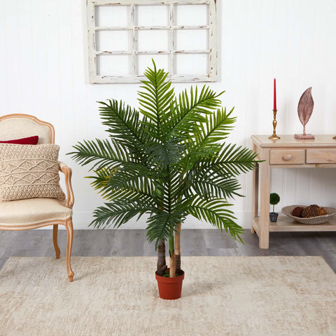 Nearly Natural planter and scale beside furniture illustrating size and easy placement