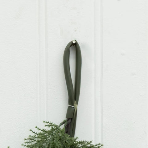 Nearly Natural garland folded for storage showing space-saving reuse benefit