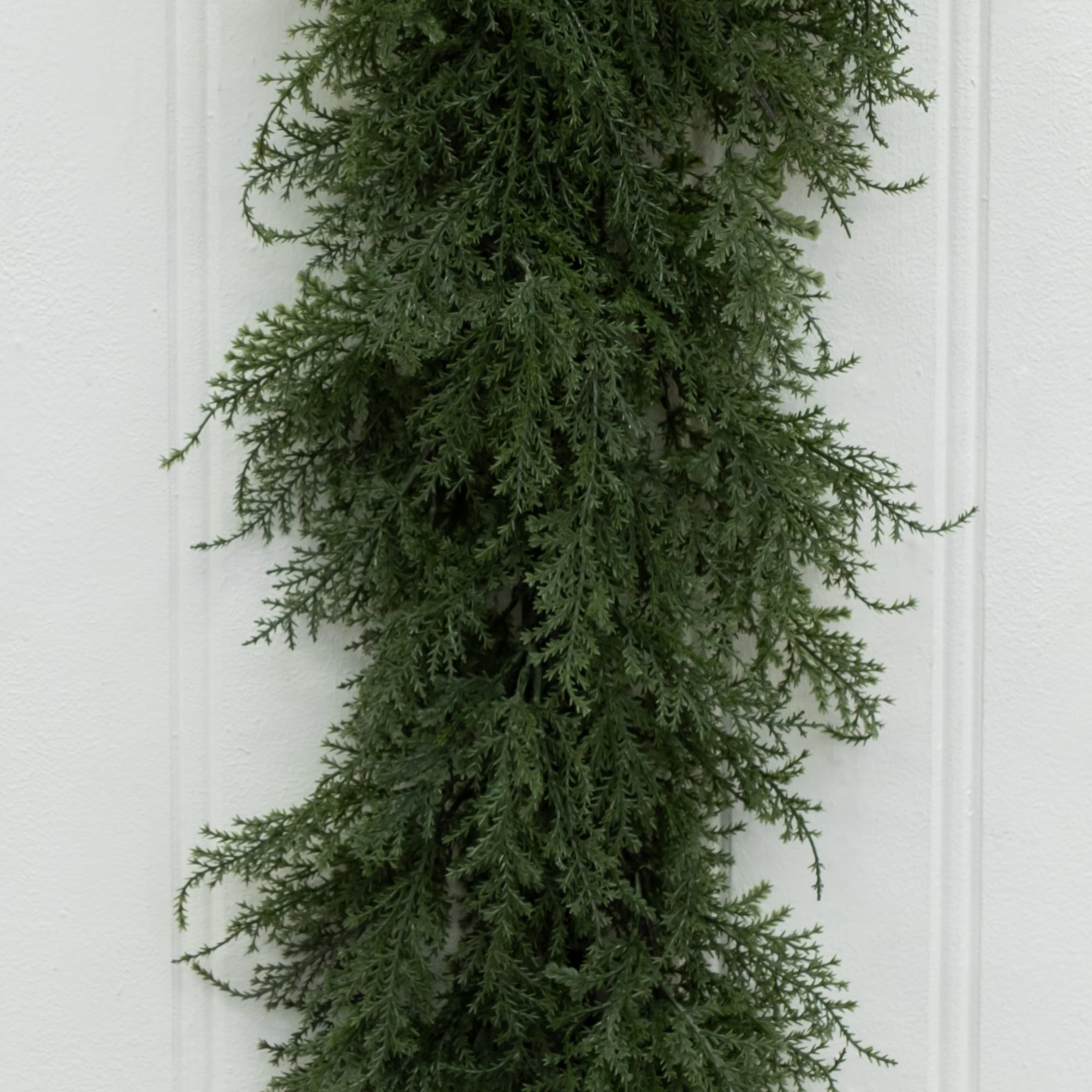 Nearly Natural garland beside ruler showing 60-inch scale and fitting guidance benefit
