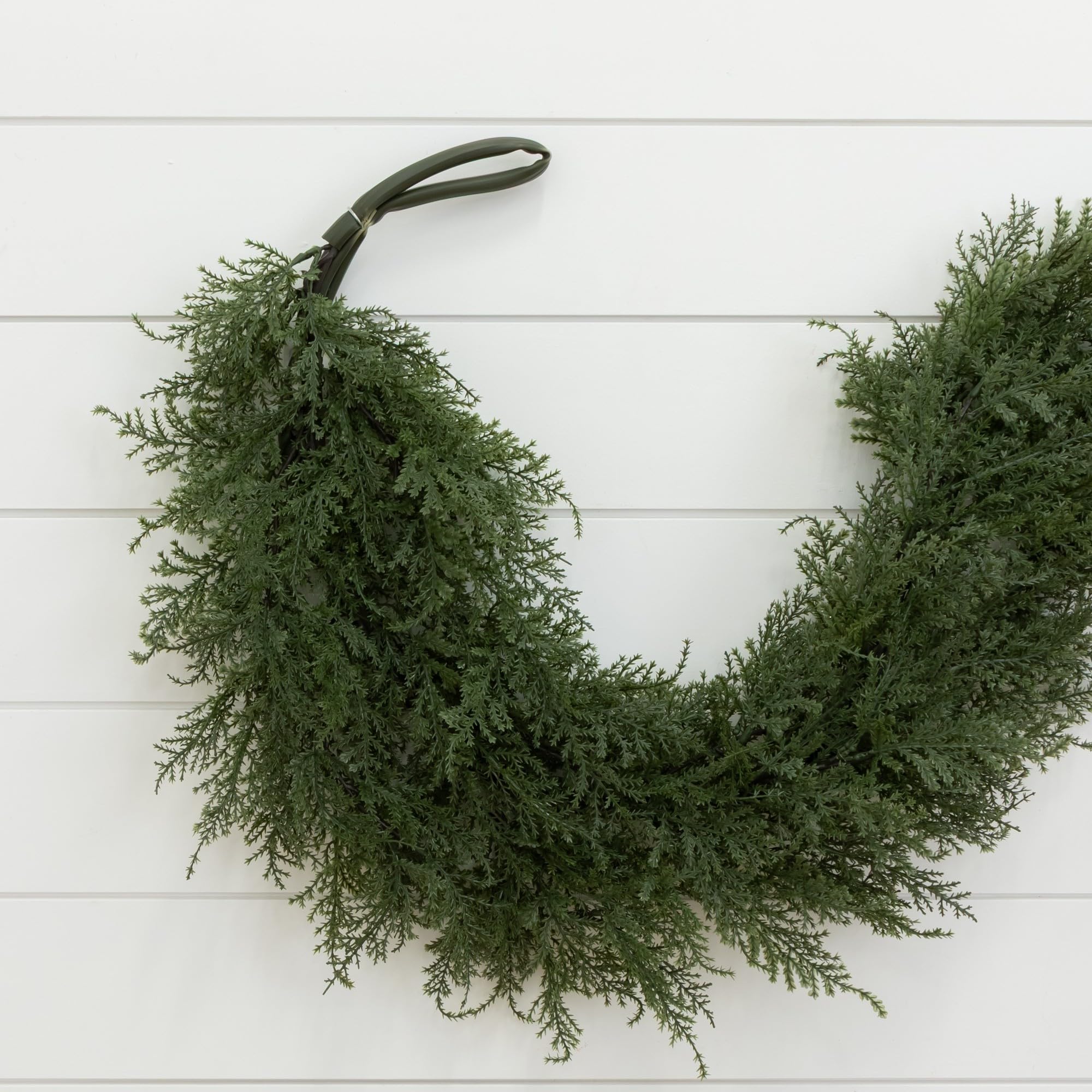 Nearly Natural garland on mantel with lights showing festive styling and low maintenance