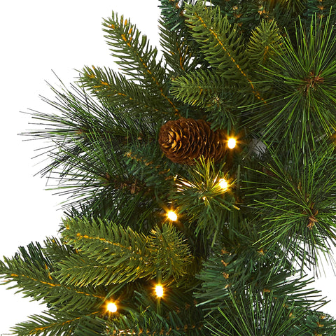 Nearly Natural LED lights lit on wreath displaying warm ambient glow