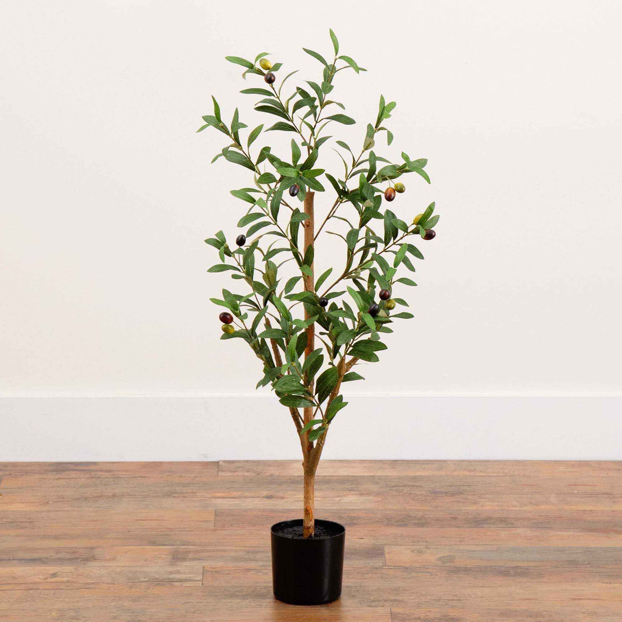 Nearly Natural on a shelf demonstrating versatile placement and visual interest