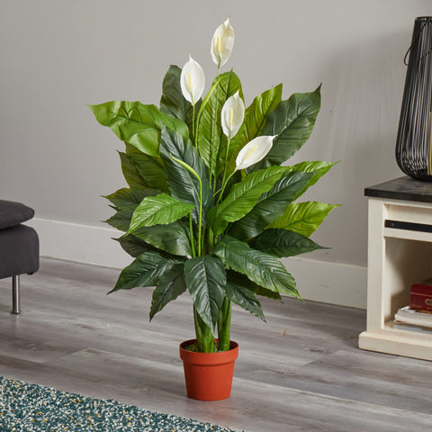Nearly Natural peace lily leaf texture detail showing glossy green foliage and natural color variation benefit