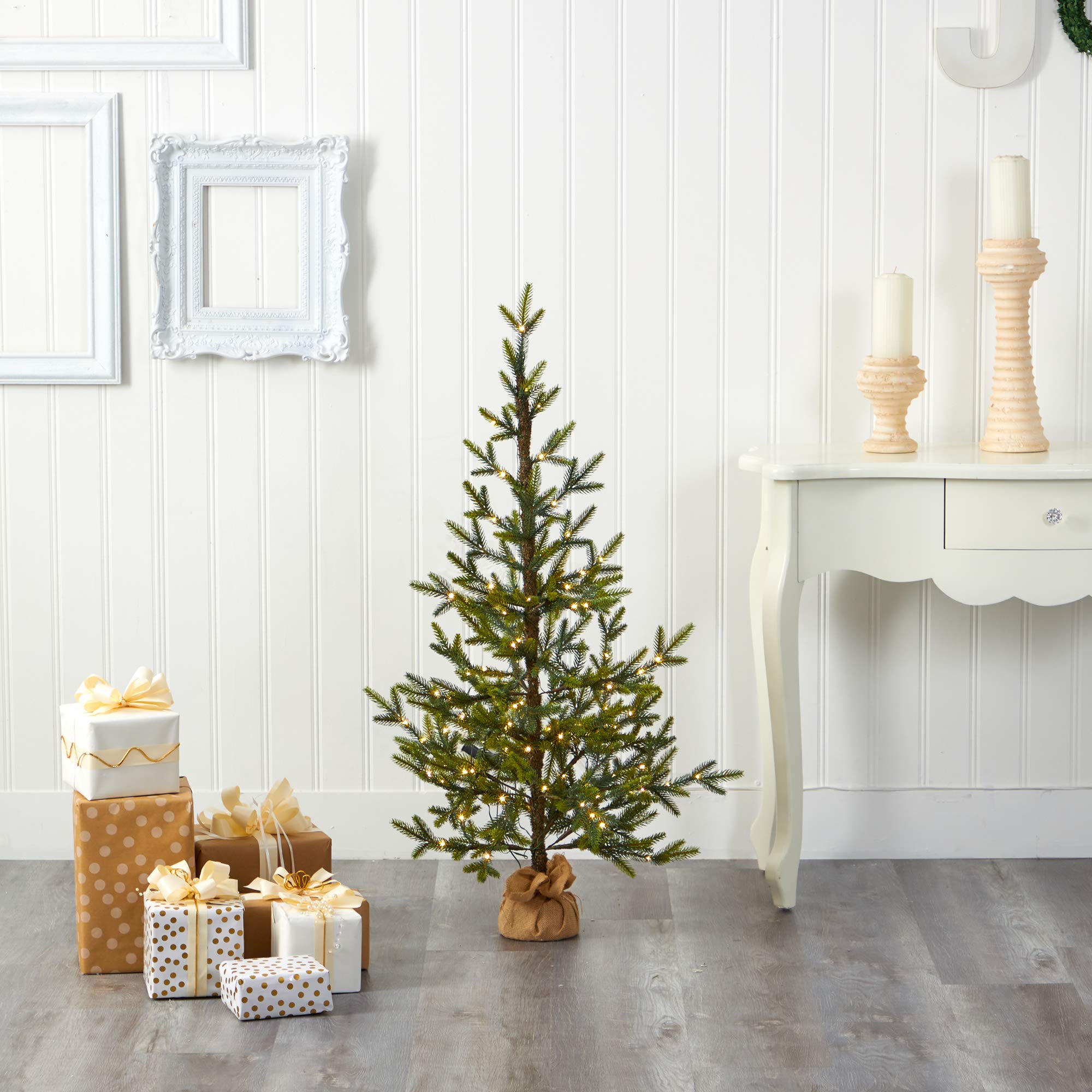 Nearly Natural tree in living room for scale demonstrating small-space holiday placement