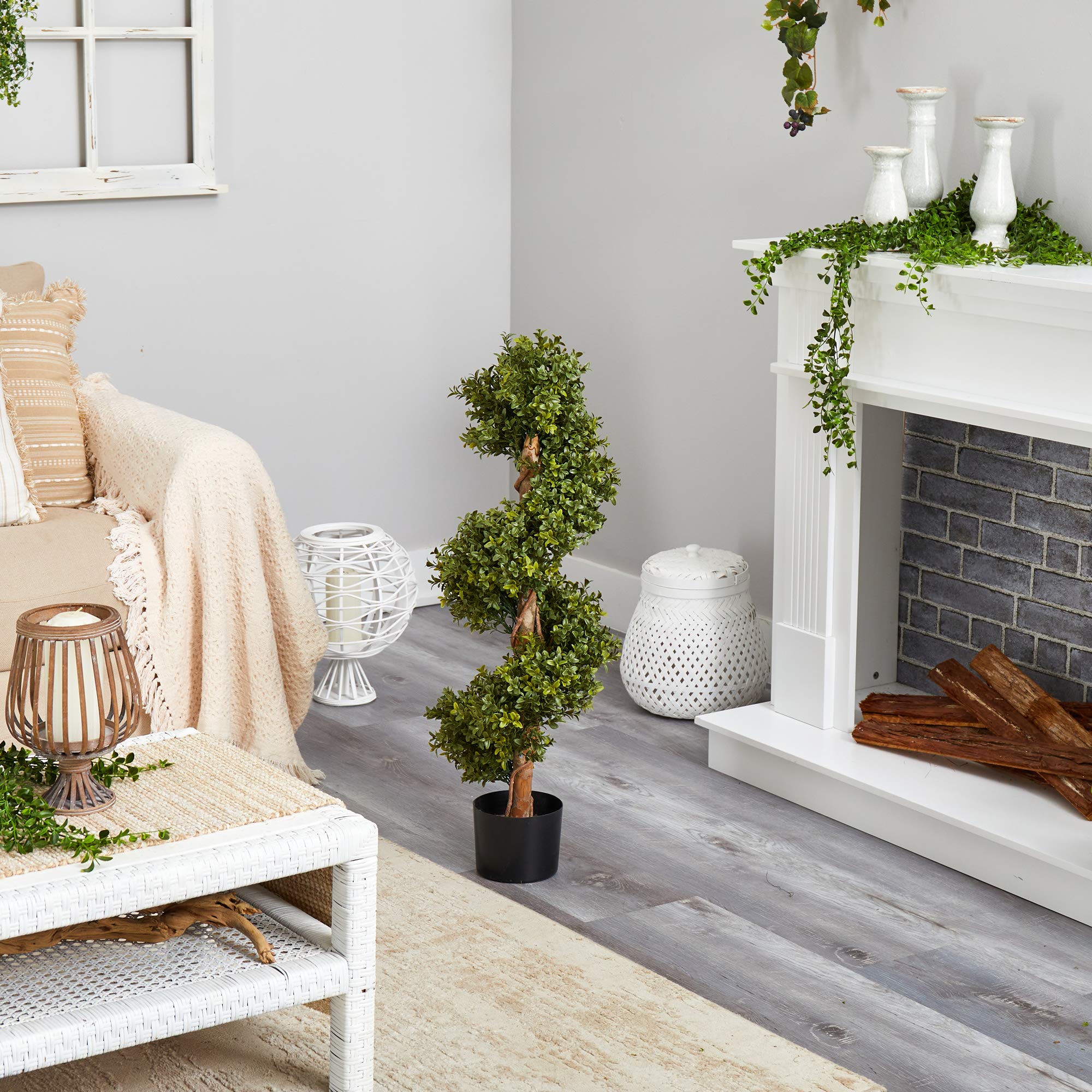 Nearly Natural topiary styled in foyer demonstrating instant decor upgrade benefit