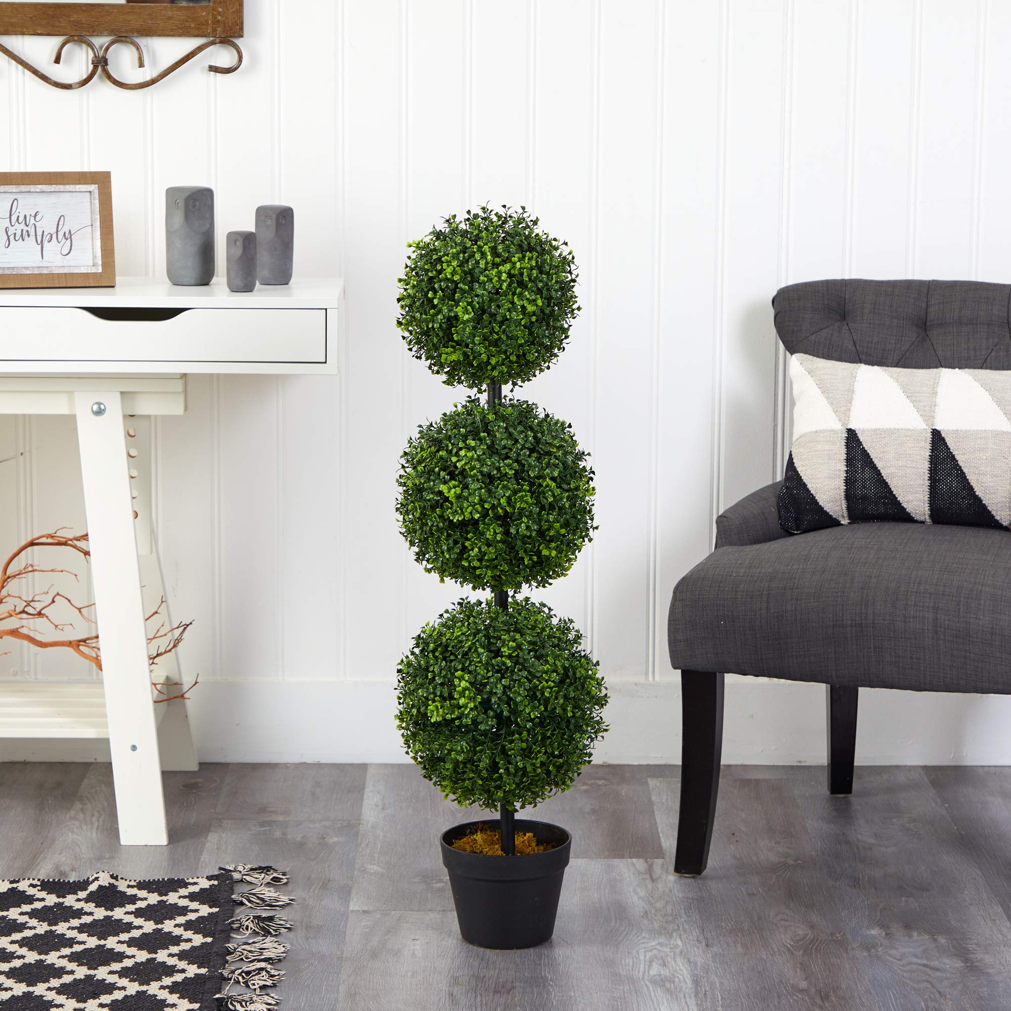 Nearly Natural topiary on a covered patio demonstrating weather-ready outdoor benefit
