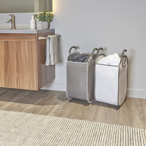 neatfreak cart staged in bathroom organizing towels and toiletries benefit