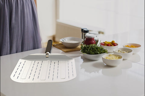 neatNuseful size comparison beside ruler, shows compact portability benefit