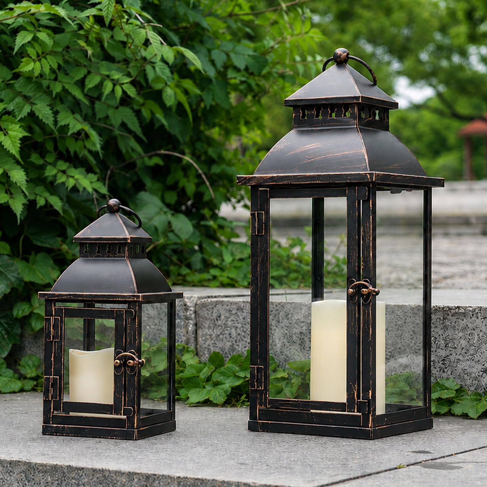 NEEDOMO front view of two bronze lanterns showing vintage appeal and layered ambiance