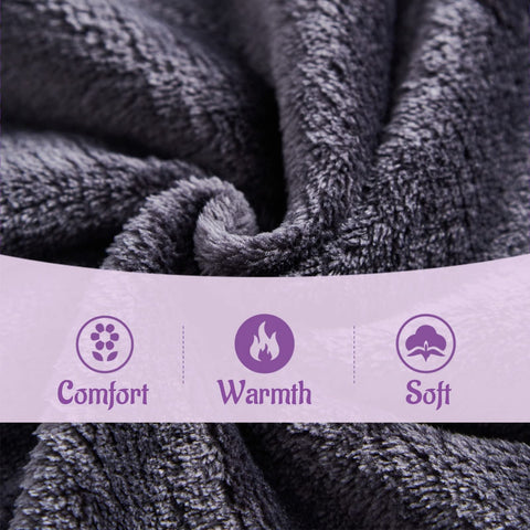 NENAGGE wearable blanket at a campfire showing outdoor coziness and protection