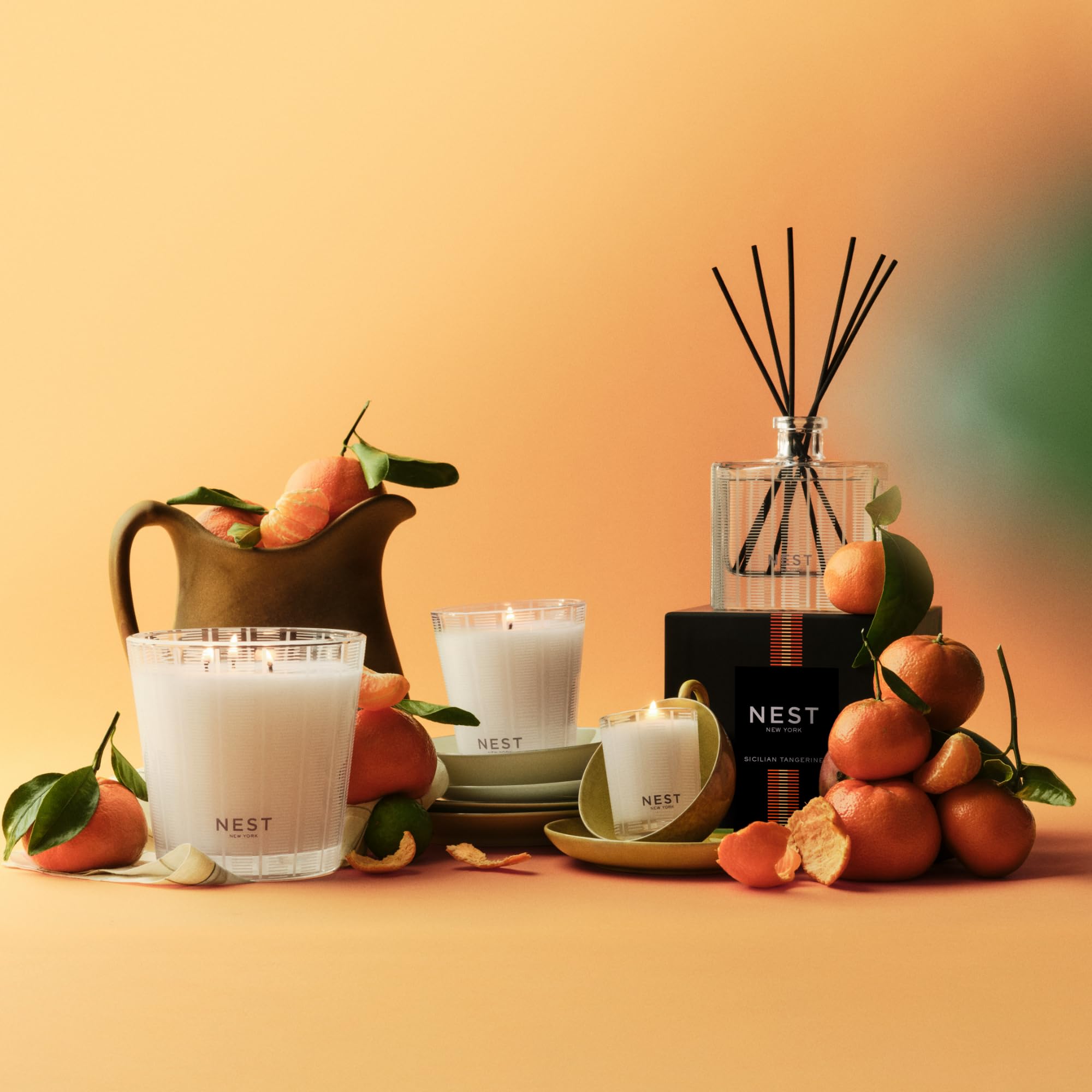 NEST New York candle beside common object displays 8.1 oz scale for placement planning
