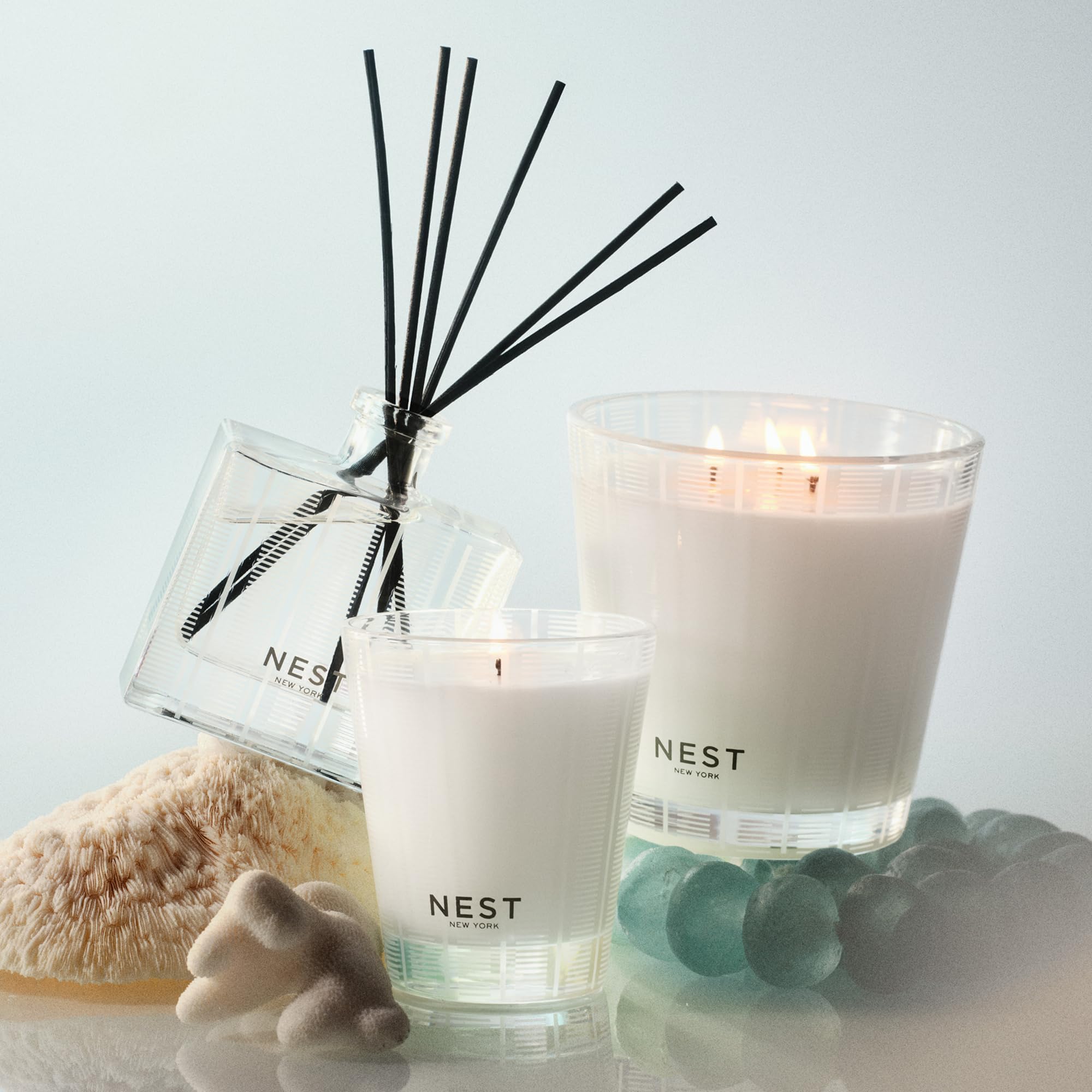 NEST New York vessel held in hand illustrating size and reusable benefit