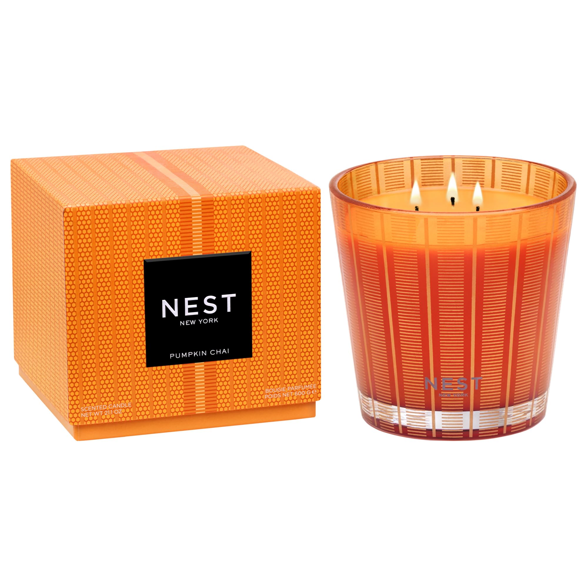 NEST New York candle front packaging showing orange glass vessel and elegant label, enhances decor
