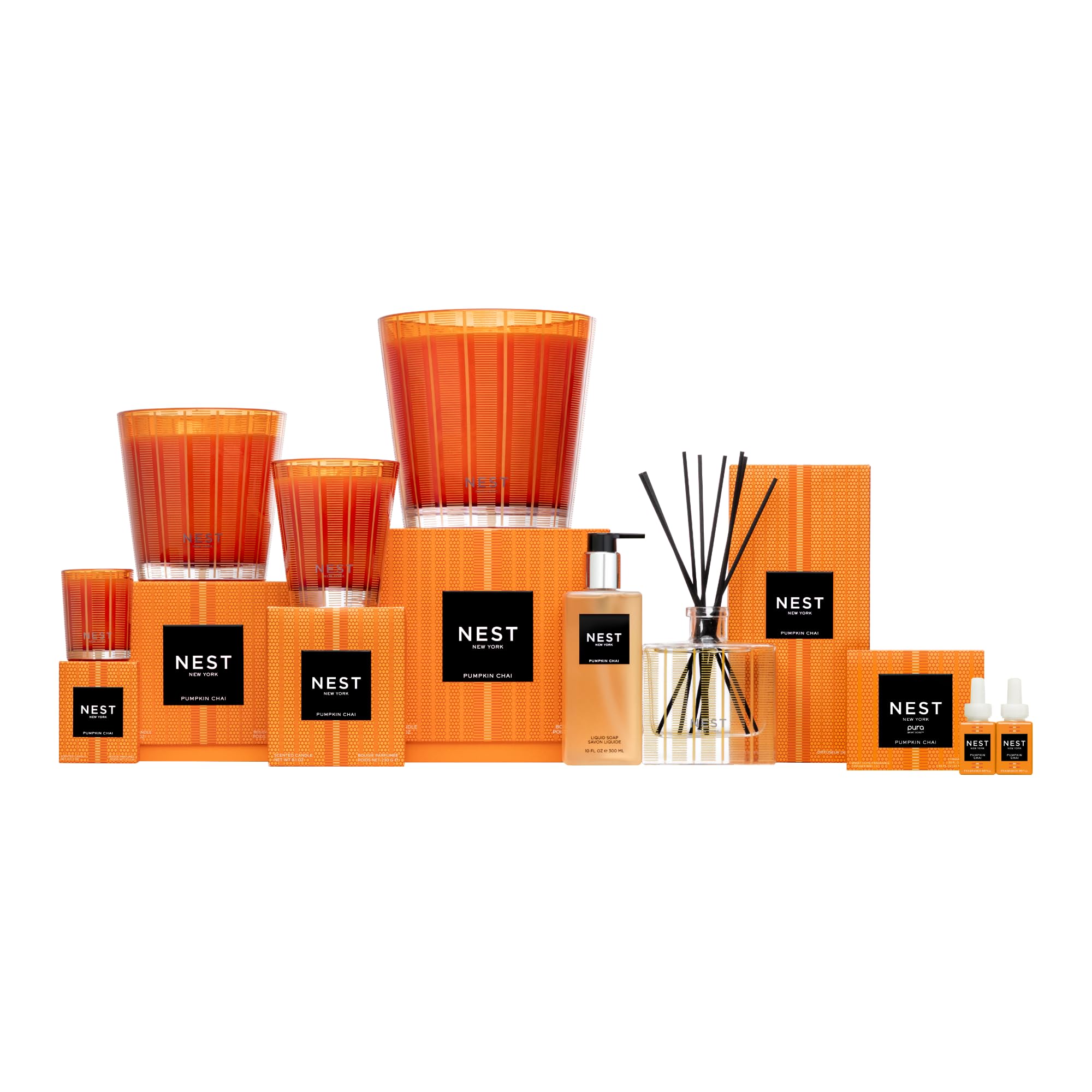 NEST New York candle in cozy living room setting, creates seasonal warm inviting atmosphere